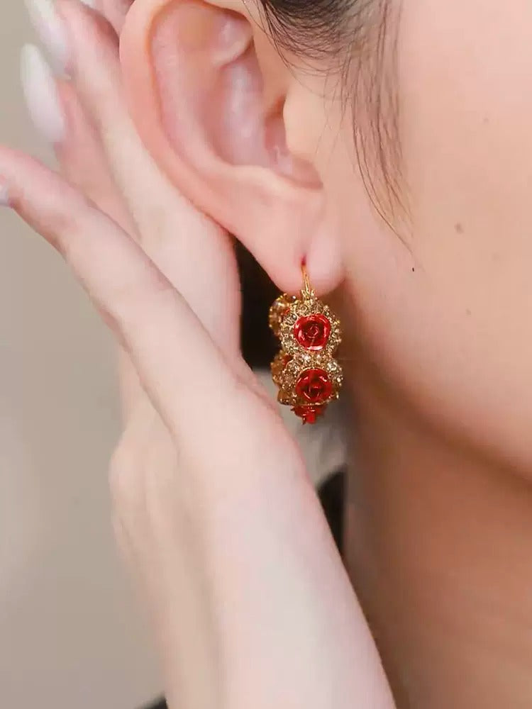 Diamond-studded red rose earring